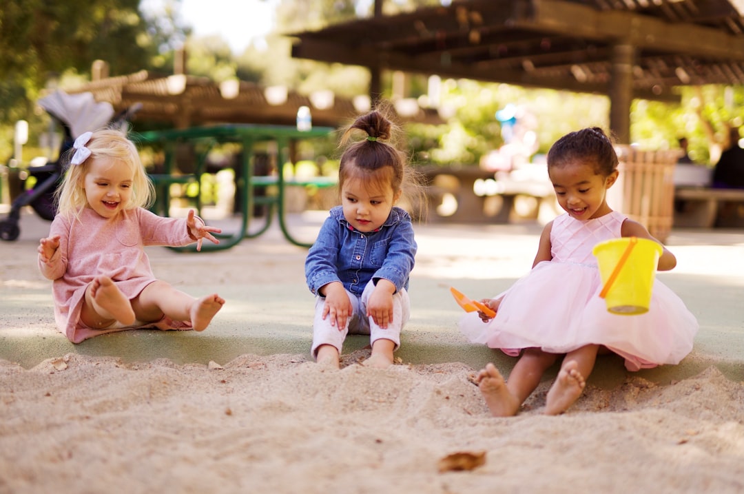 children lifting hands