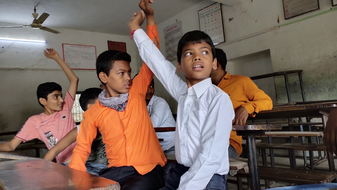 woman teaching girl
