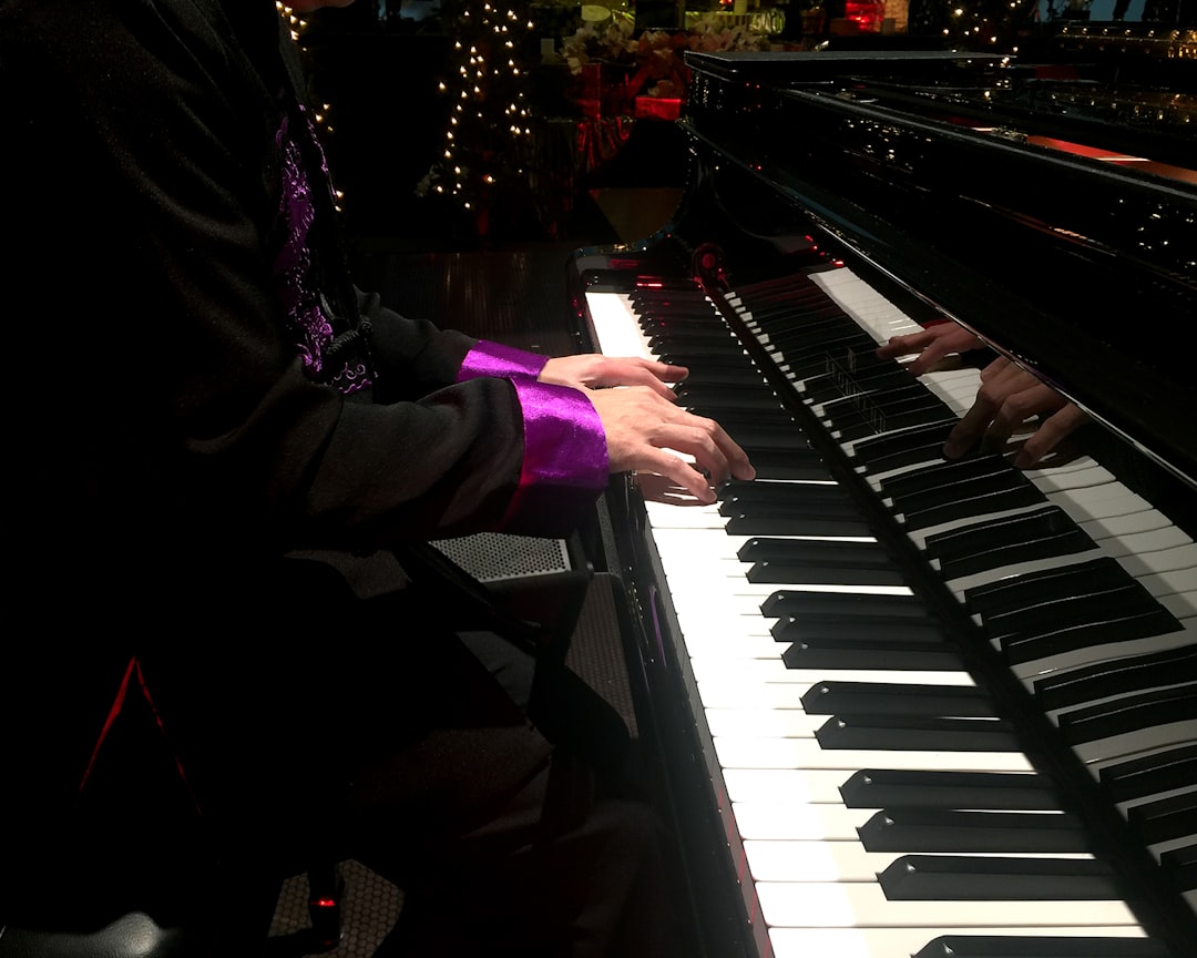 a close up of a person playing a keyboard